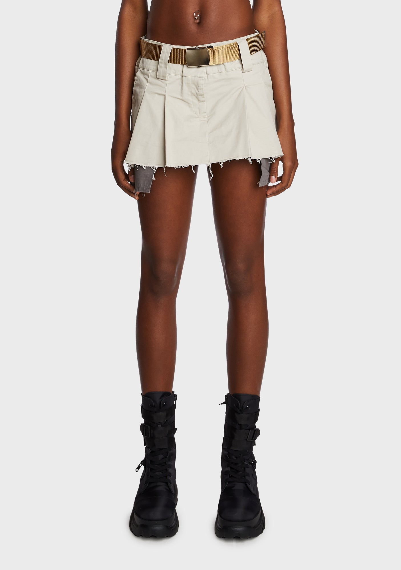 Pleated mini skirt 7 little words top