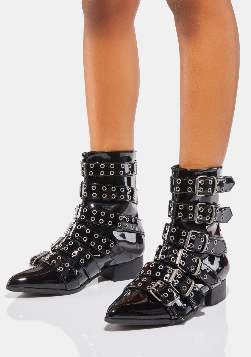 black patent buckle boots