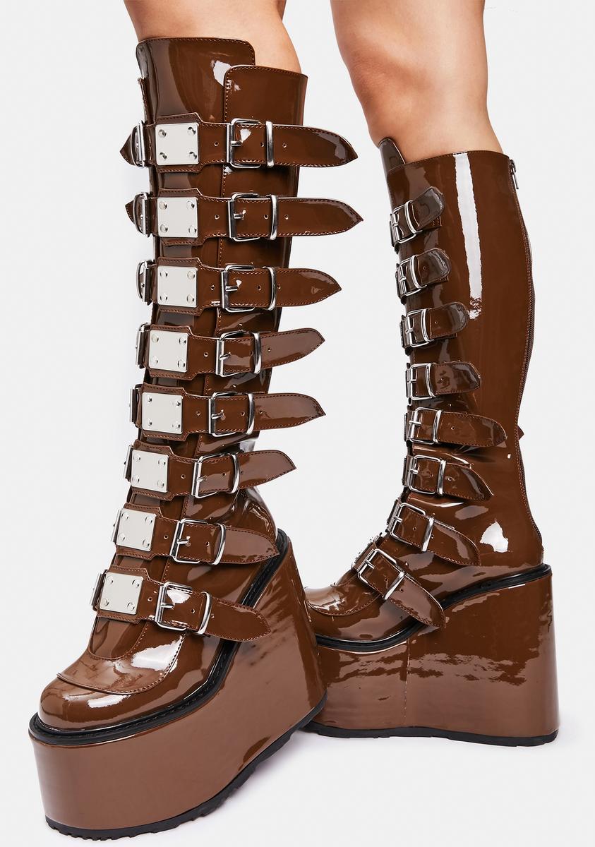 Demonia Knee High Buckle Platform Boots - Brown Patent